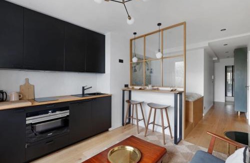 Quartier des Grandes-Carrieres Apartment | Architect Studio