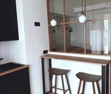 Quartier des Grandes-Carrieres Apartment | Architect Studio