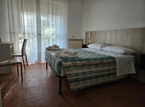 Why Not in LʼAquila